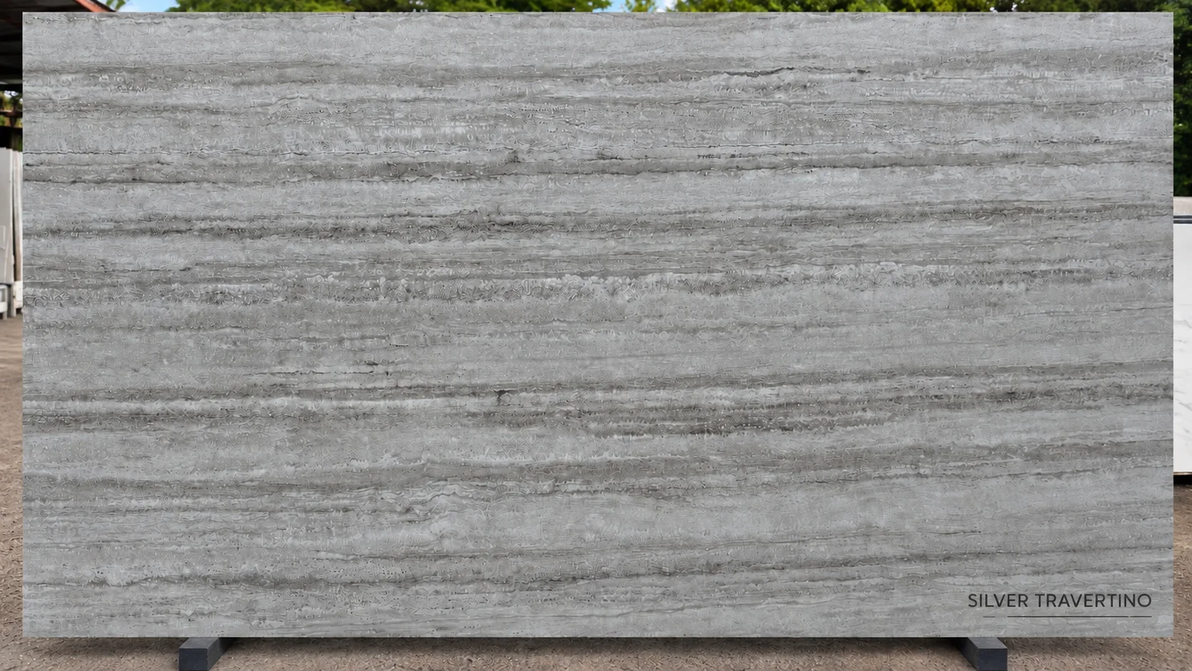 Silver Travertino gray porcelain surface with a linear travertine look